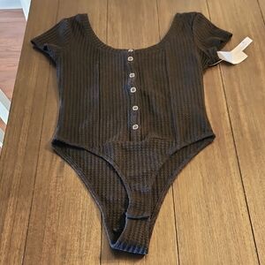 Womans Black Ribbed One Piece Body Suit